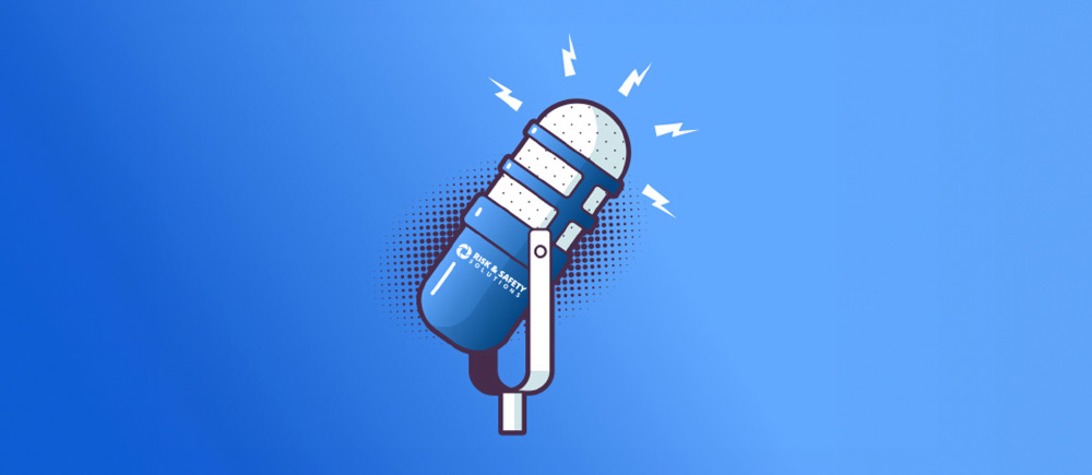 An image with a blue background and a microphone positioned in the center represents a focus on communication or broadcasting.